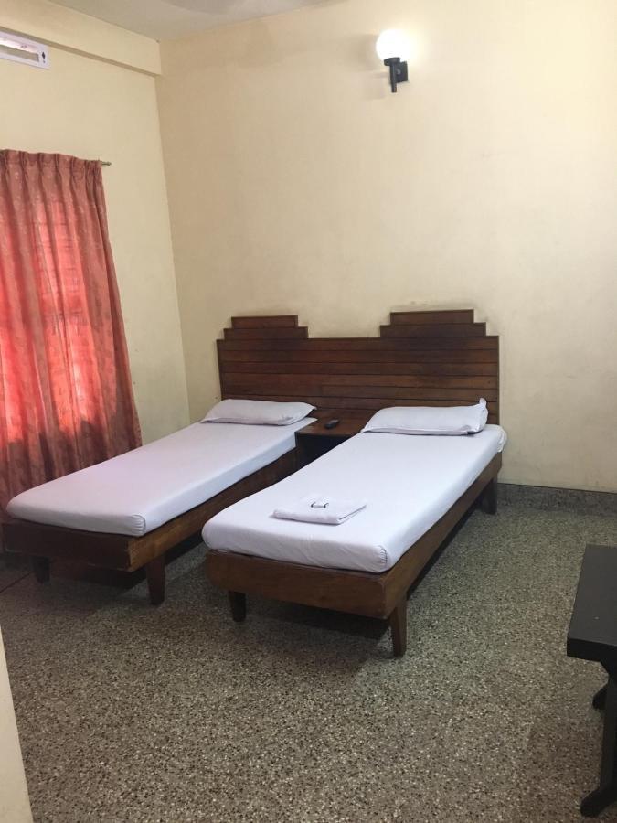 Nellimoottil Guest House Kottayam Kamer foto